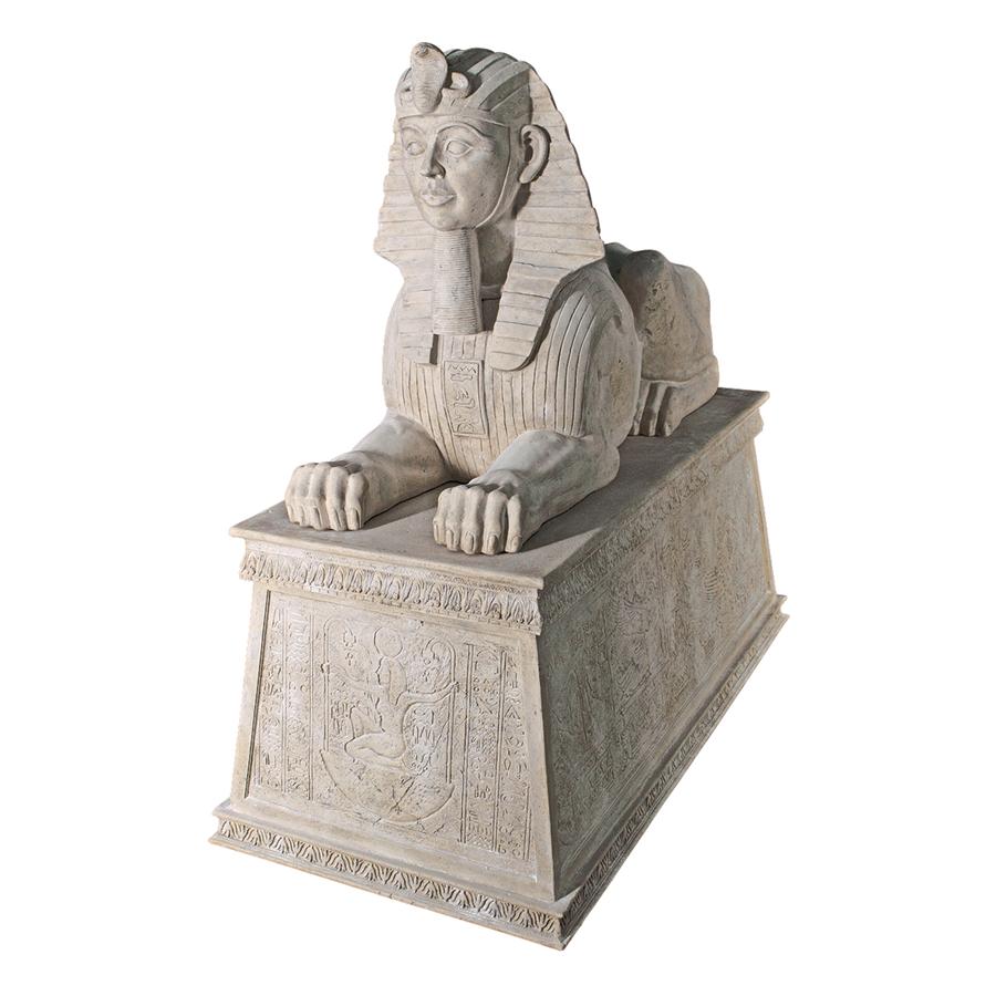 Grand Stone Sphinx Statue atop a Egyptian Plinth