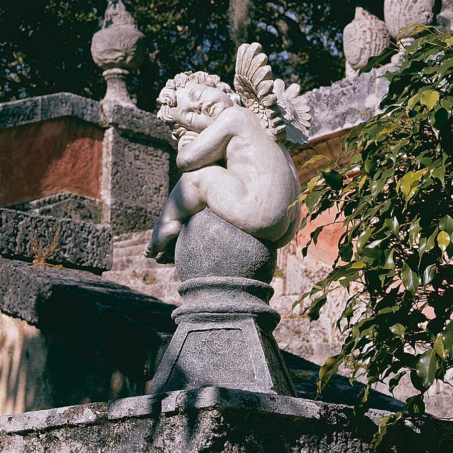 Balancing a Dream Cherub Garden Statue