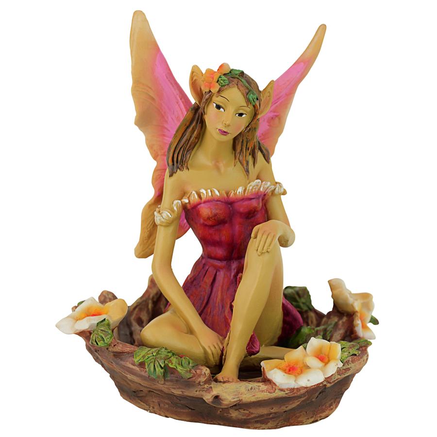 The Red and Green Fairy of Acorn Hollow Statues: Red