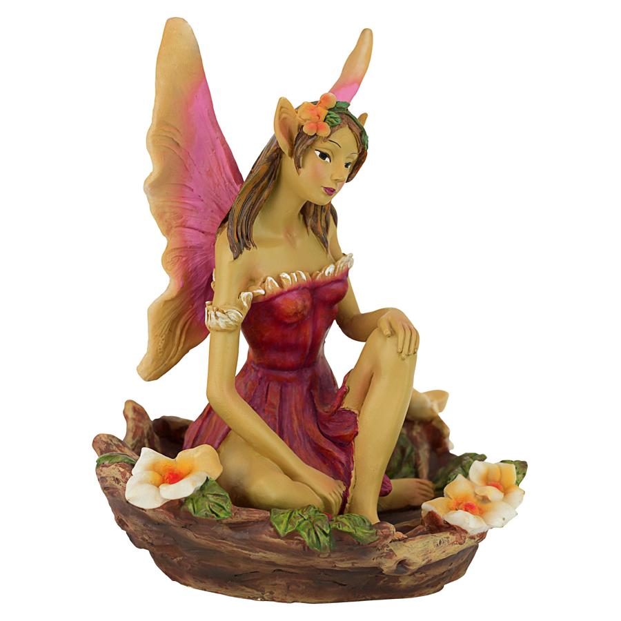 The Red and Green Fairy of Acorn Hollow Statues: Red