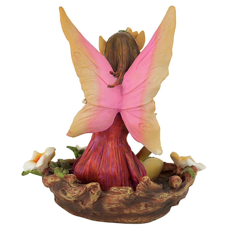 The Red and Green Fairy of Acorn Hollow Statues: Red