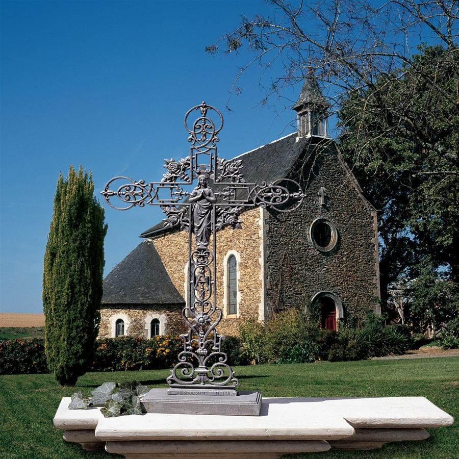 The Veneration: Our Lady of the Roses Iron Cross Statue